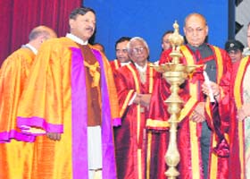 Governor Urmila Singh (extreme right) and Chief Minister PK Dhumal light a lamp at the convocation of Jaypee University at Waknaghat on Monday