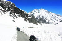 Vehicles move on the Srinagar-Leh Highway that was thrown open to traffic on Monday. 