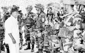Defence Minister AK Antony interacts with army jawans during a visit to Jaisalmer on Monday to review the preparedness of Army troops along the Pakistan border