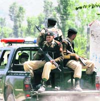 Pakistani soldiers patrol in the vicinity of a compound where it is believed Osama bin Laden lived in Abbottabad,