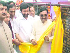 Chief Minister Ramesh Pokhriyal Nishank lays a foundation stone in Pithoragarh on Tuesday.