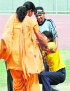 An athlete collapses during the inter-state Industrial Training Institute Athletics Meet at Guru Nanak Stadium in Ludhiana on Tuesday