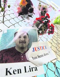 A poster of Ken Lira, who was killed in 