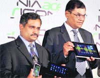 Acer India MD W S Mukund (R) and chief marketing officer S Rajendran at the launch of company's 'ICONIA Tab A500' series android-based tablets, in Mumbai