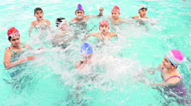 With the mercury rising, children beat the heat in a swimming pool in Chandigarh on Wednesday.