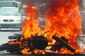 A bike caught fire after an accident near India Gate in New Delhi on Wednesday