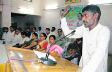 A farmer makes a point during a meeting of the Uttarakhand unit of the BKU in Dehradun on Wednesday.