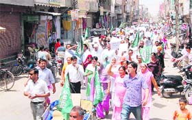 INLD activists hold a protest in Sirsa on Wednesday