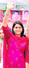 Priya Dutt, Secretary, All-India Mahila Congress Committee, waves to the crowd in Amritsar 