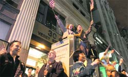 Americans celebrating Osama bin Ladens killing at Ground Zero. US president Barack Obama will meet families of 9/11 victims at Ground Zero on Thursday. This will be Obamas first visit to the site since assuming office. Obama invited former President George W Bush and former New York City Mayor Rudy Giuliani.
