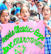 Students of Ashmah School take out an awareness rally near Phase VII lights point in Mohali on Thursday. 