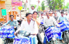 Social activists create awareness in Haridwar against graft and social evils, supporting the Anna Hazare-Swami Ramdev anti-corruption movement, on Thursday.