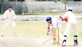 A batsman being stumped during a match between Ludhiana and Chandigarh being played at Satish Chander Dhawan Government College in Ludhiana on Thursday