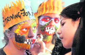 Students participate in a face-painting competition during a science fest organised by Guru Nanak School, Sarabha Nagar, in Ludhiana on Thursday