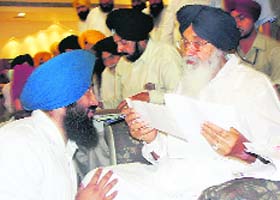 Punjab Youth Congress general secretary Kamaljeet Singh Brar hands over a memorandum to the Chief Minister