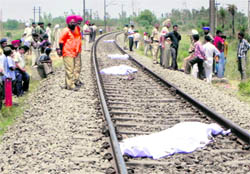 Bodies of four children who were run over by the Lucknow-Chandigarh Sadhbhavana Express on the Chandigarh-Ambala railway track in Dera Bassi on Friday