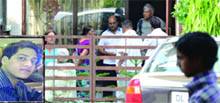 Relatives gather after the murder of Shobit Modi (inset) in Vasant Kunj in New Delhi on Friday. 