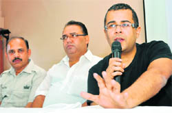 Chetan Bhagat addresses mediapersons in Dehradun on Friday.