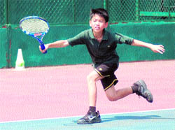 A player in action in the Uttarakhand State Open Junior Tennis Tournament in Dehradun on Friday. 