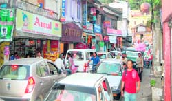 A view of a traffic jam in the Kotwali Bazaar in Dharamsala