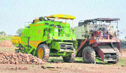 Combine harvesters from Punjab being used for wheat harvesting at Agra Chak village in Jammu on Friday
