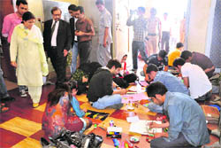 Students take part in a workshop organised by the Department of Student Welfare, Kashmir University, at Gandhi Bhawan. 