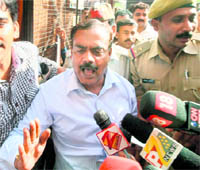BSP MLA Shekhar Tiwari comes out of the court in Lucknow on Friday.
