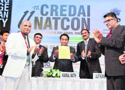 Union Minister of Urban Development Kamal Nath releases a publication during the inauguration of 11th CREDAI Natcon in Singapore recently.