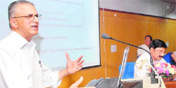 GK Pillai, Union Home Secretary, addresses delegates during an inaugural session at Panjab University in Chandigarh on Saturday.