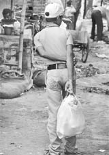 Despite a ban on the use of polybags, a boy seen carrying one in Zirakpur. 
