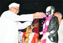 Governor Jagannath Pahadia pays tributes to Red Cross founder Jean Henry Dunant at a function in the NDRI in Karnal on Sunday