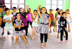 Children participate in a talent hunt contest at GMT Public School in Ludhiana
