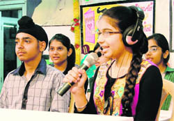 Students participate in a radio talk show to mark Mothers Day at Green Land Senior Secondary School in Ludhiana. Photo: Inderjeet Verma