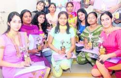 Students, who were felicitated during an award ceremony, with their trophies at Panjab University, Chandigarh