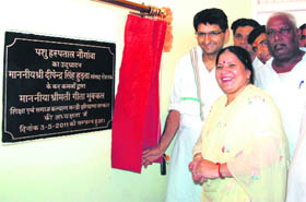 Haryana Education Minister Geeta Bhukkal and MP Deepender Hooda inaugurate a veterinary hospital at Naugaon village in Jhajjar.
