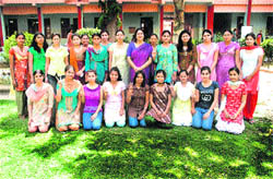 Merit holders of Hindu Girls College, Sonepat, with principal Nirmal Jabbal. 