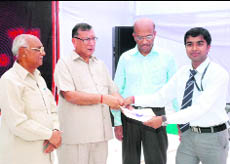 Amrendra Singh (extreme right) receives the Best All-Rounder Student Award from Dr TK Garg (second from left), director in-charge, National Institute of Technology, Kurukshetra. 