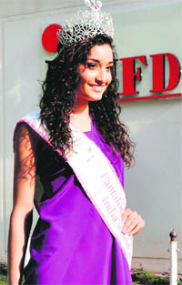 Miss India World Kanishtha Dhankar poses for shutterbugs in Ludhiana. 