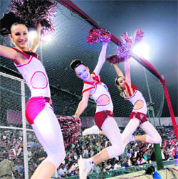 Cheer leaders in action during the match between Kings XI Punjab and Mumbai Indians at the PCA stadium in Mohali on Tuesday.