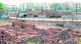 A block of Sector 63 flats of the CHB, coming up close to residential plots at Phase IX in Mohali. 