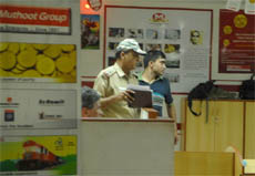 Policemen at the Muthoot Finace office in Pandav Nagar, New Delhi on Tuesday.