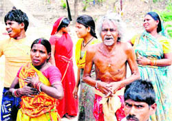 A few of the affected residents of the slum