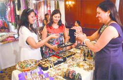 Girls at a jewellery stall at an exhibition in Jalandhar