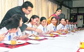 Chef Hitesh Arora gives tips to students on table manners at Sacred Heart Convent School in Ludhiana on Tuesday