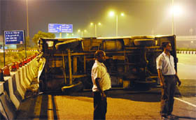 An RTV overturned at Shakarpur chungi near Vikas Marg on Tuesday night. 