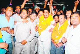 Members of the BHEL Majdoor Kalyan Parishad exult at the success in the elections on Wednesday. 