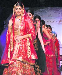 Models walk the ramp during a wedding carnival in Gurgaon