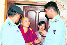 Policemen enquire into the suicide case at Sidhbari near Dharamsala on Wednesday.