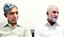ICAR Director General S Ayyapan (R) and Palampur farm varsity VC SK Sharma at Palampur on Wednesday. 