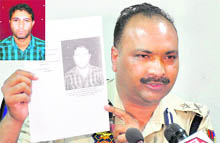 IGP Jammu Dilbagh Singh shows picture of Udhampur blast mastermind Ghulam Sarwar, alias Firdous (see inset), in Jammu on Wednesday.